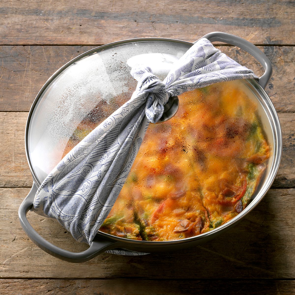 How to pack food to go, small pan with lid tied on