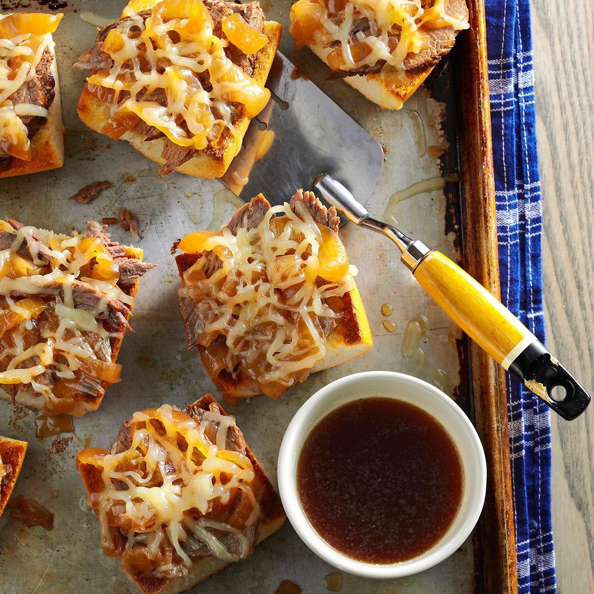 Onion Beef Au Jus on a sheet pan