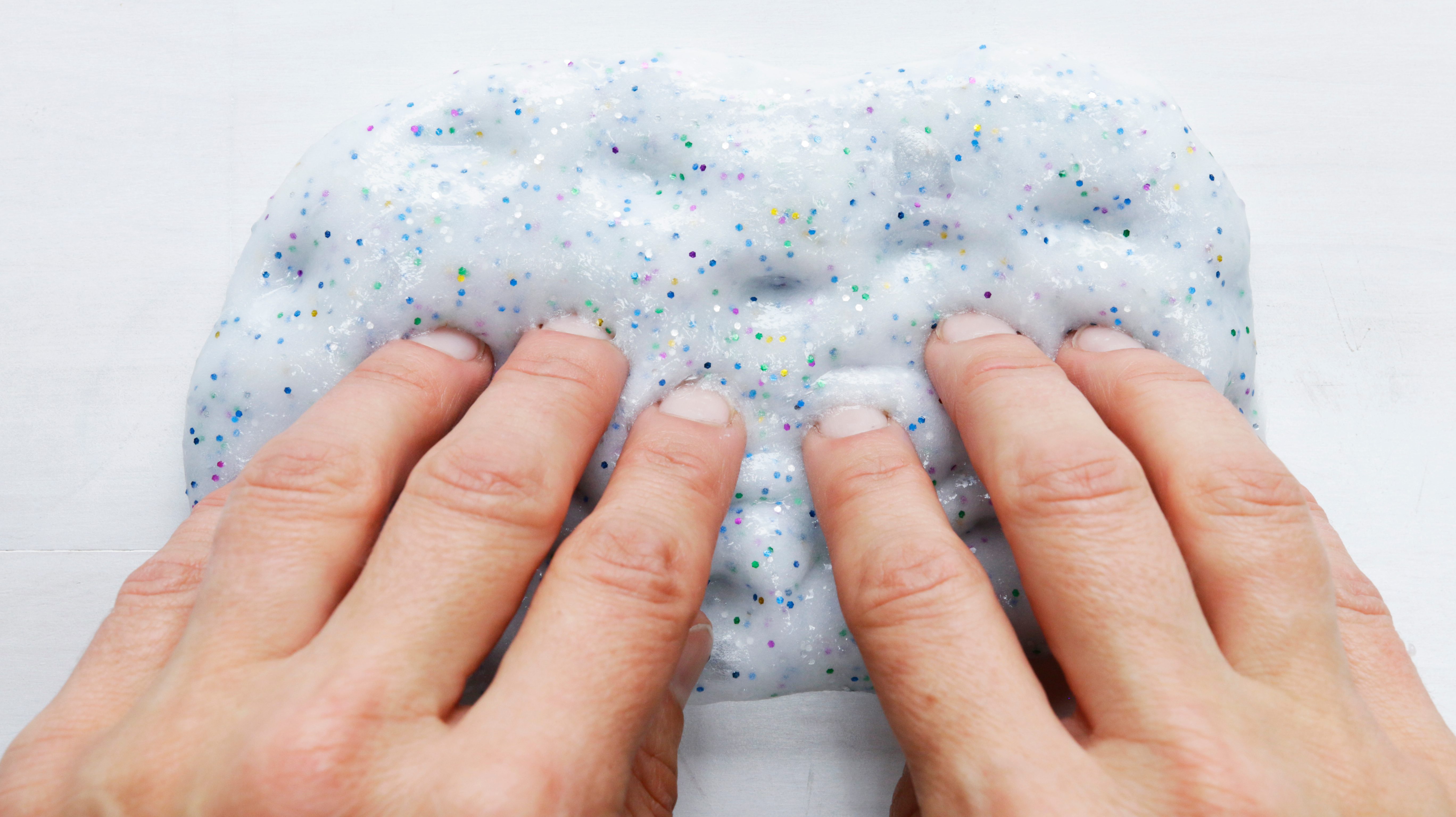 Person kneading their homemade slime 