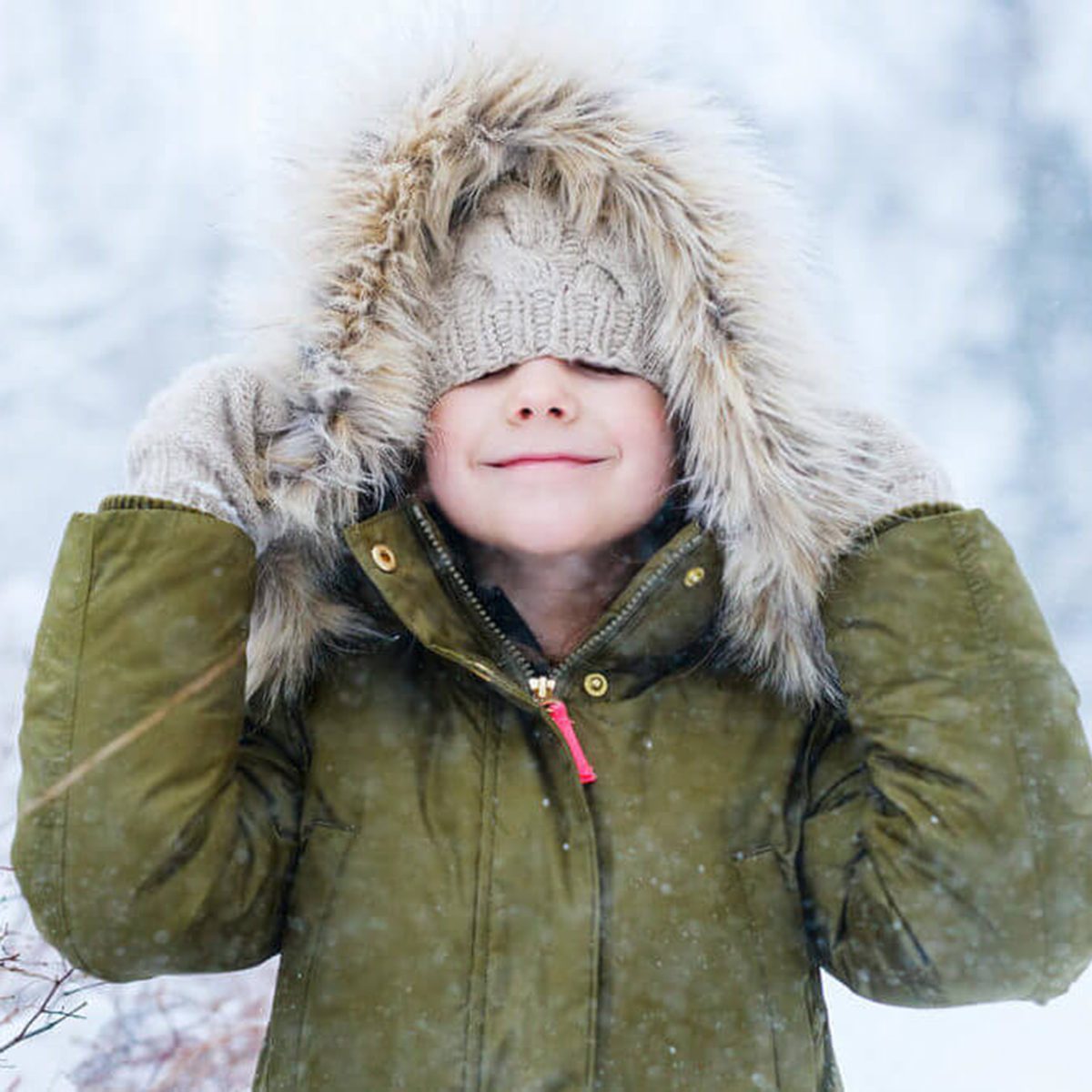 Adorable little girl outdoors on beautiful winter snow day; snow day
