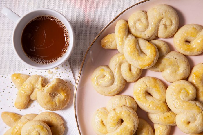 Greek Holiday Cookies with black coffee on a table