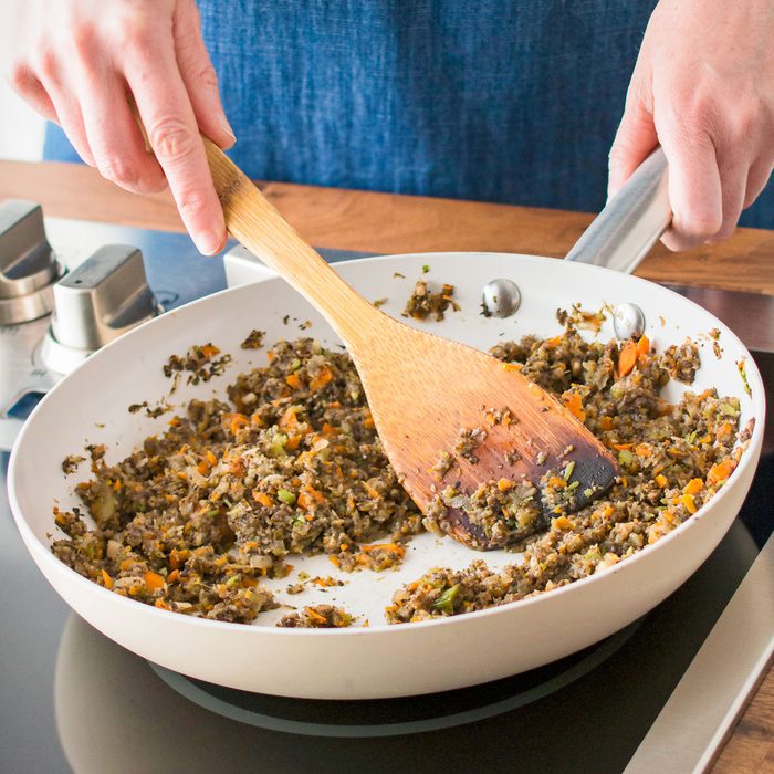 Cooking Mushroom Vegetable Mixture in a Pan