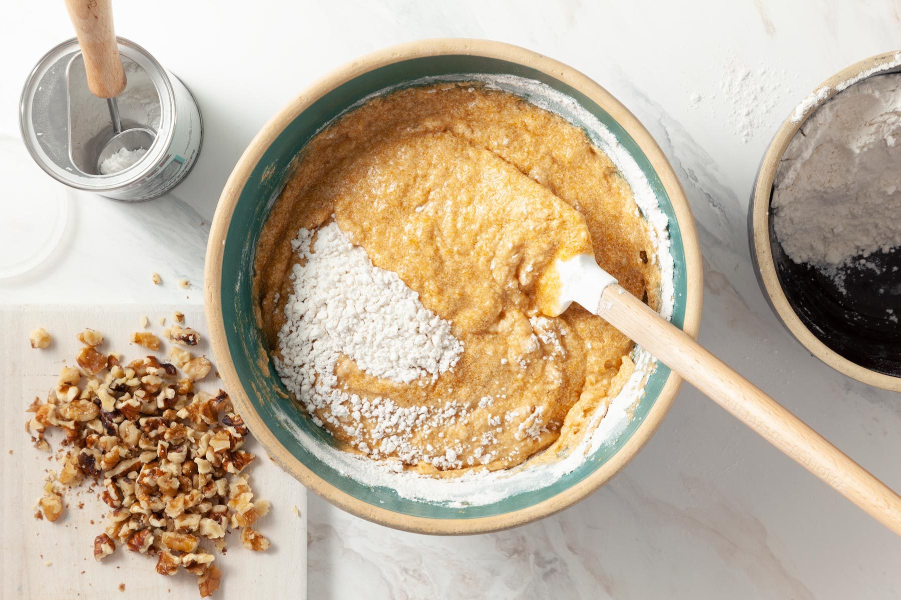 A Bowl of Mixture With a Spoon