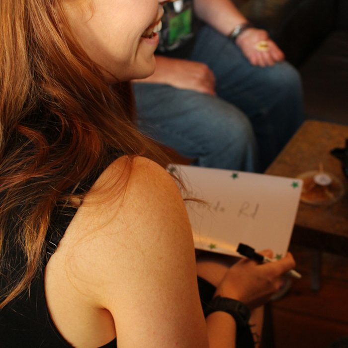 Girl playing quiz night; Shutterstock ID 1060742705; Job (TFH, TOH, RD, BNB, CWM, CM): Taste of Home