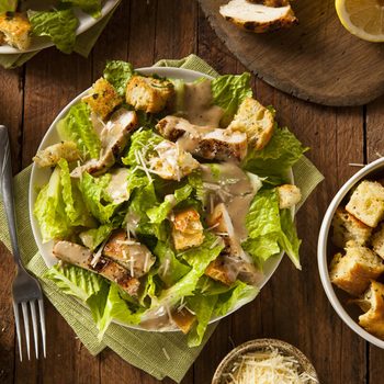Healthy Grilled Chicken Caesar Salad with Cheese and Croutons