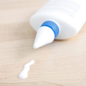 Glue on a wooden surface