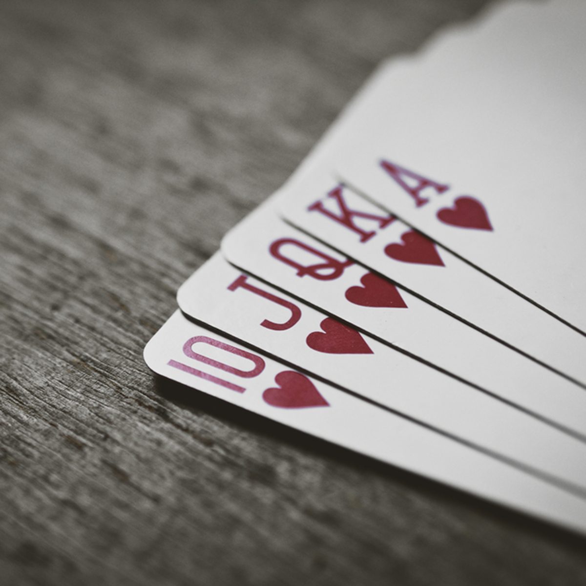 Closeup of heart royal flush the highest ranking hand in hold