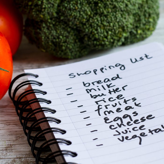 Preparing the shopping list before going to buy the groceries. ; Shutterstock ID 221603185