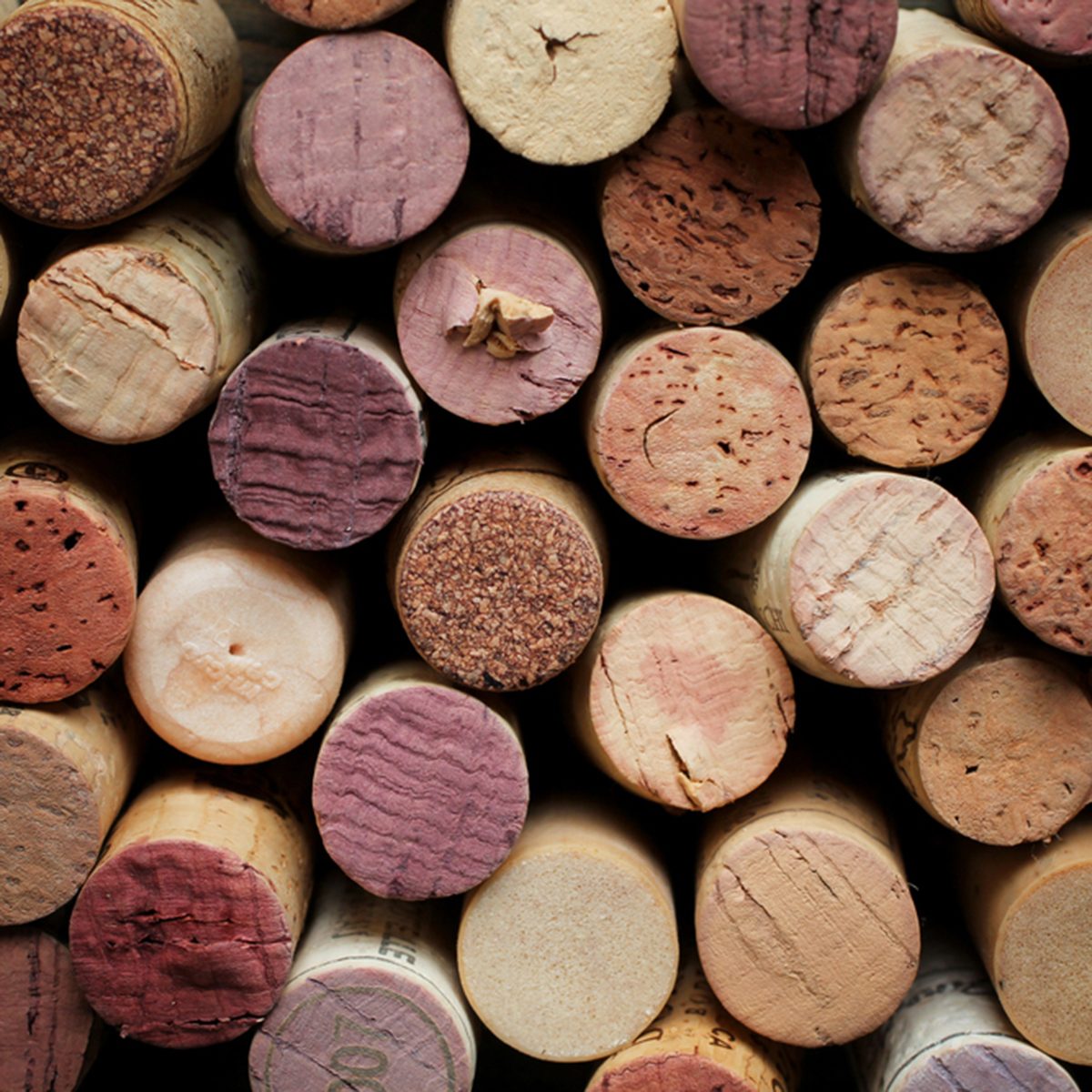 Close up of a cork wine with different variation of wine color