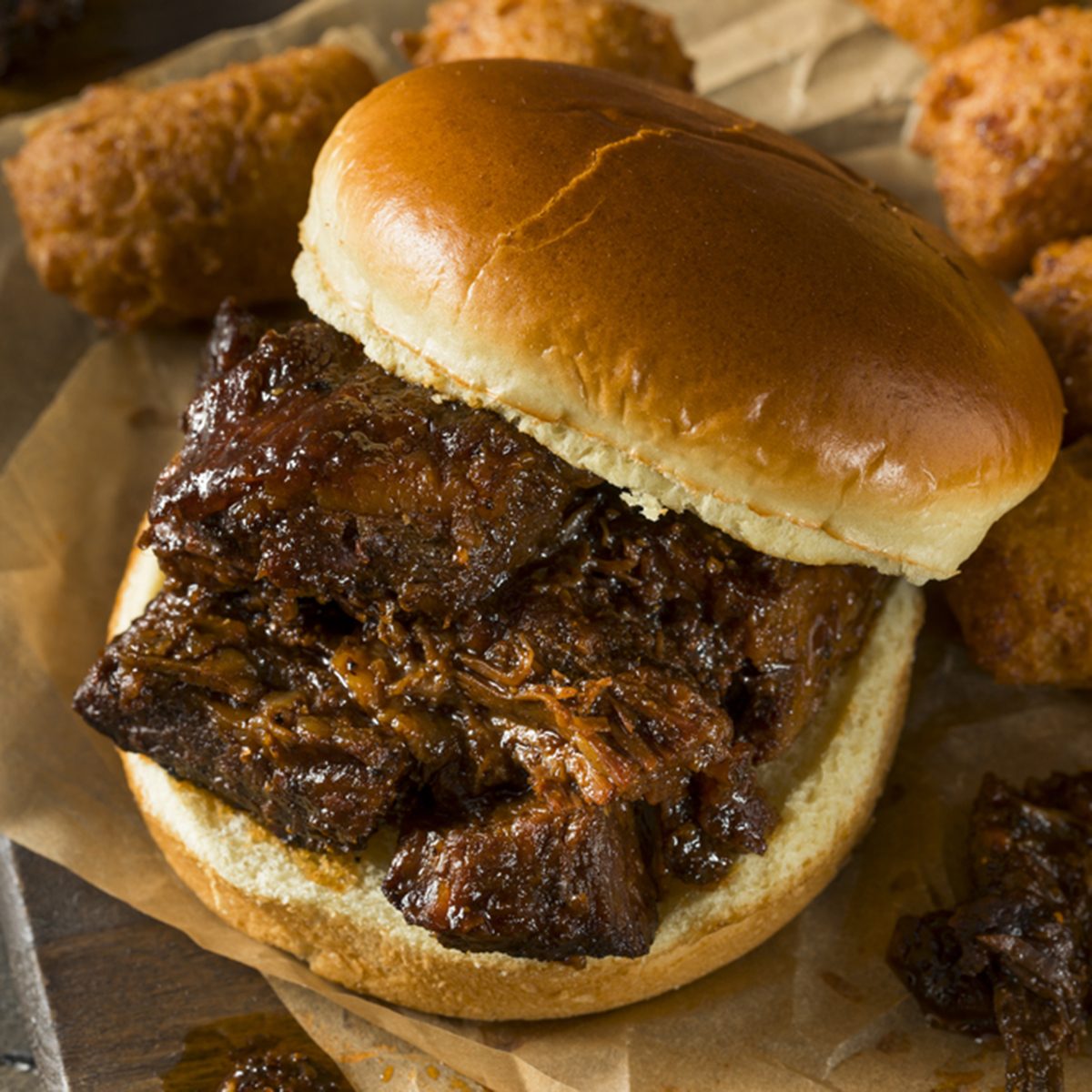 brisket burnt ends sandwich on a bun