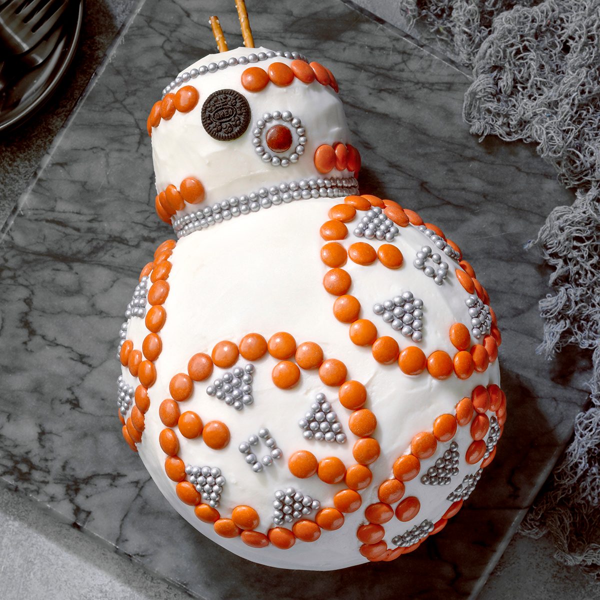 BB-8 Cake; overhead camera angle; Gray surface; gray cutting board; cake; star wars; May the 4th be with you; dessert; cake