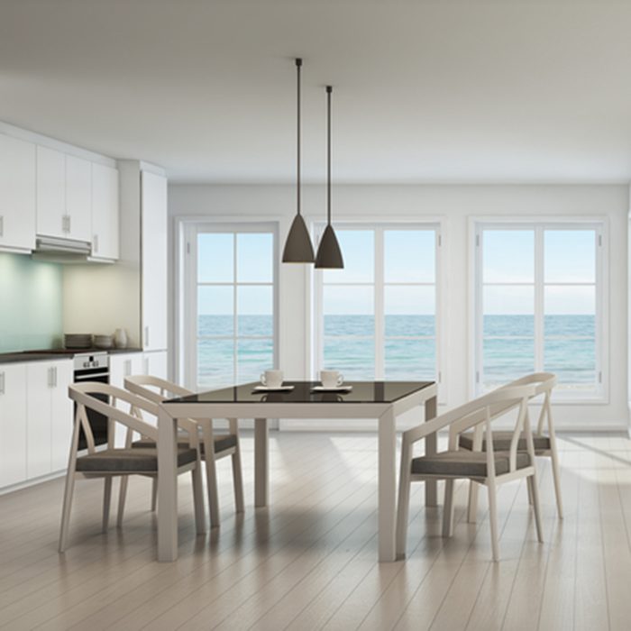 Sea view dining, living room and kitchen in beach house