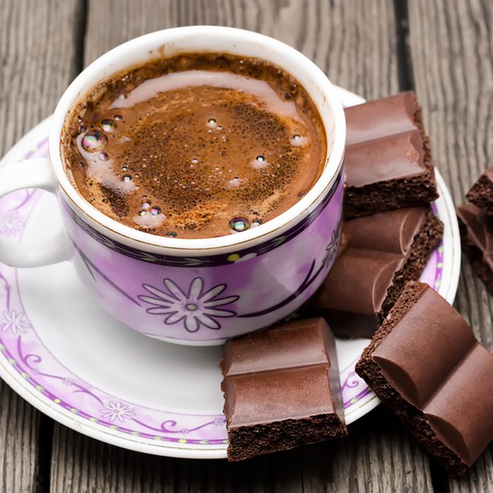 cup of coffee with chocolate on a table