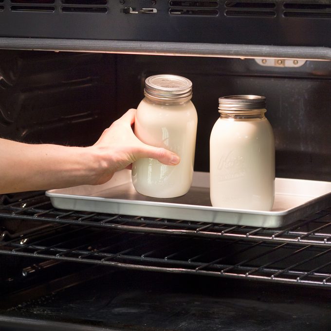 two filled mason jars in the oven