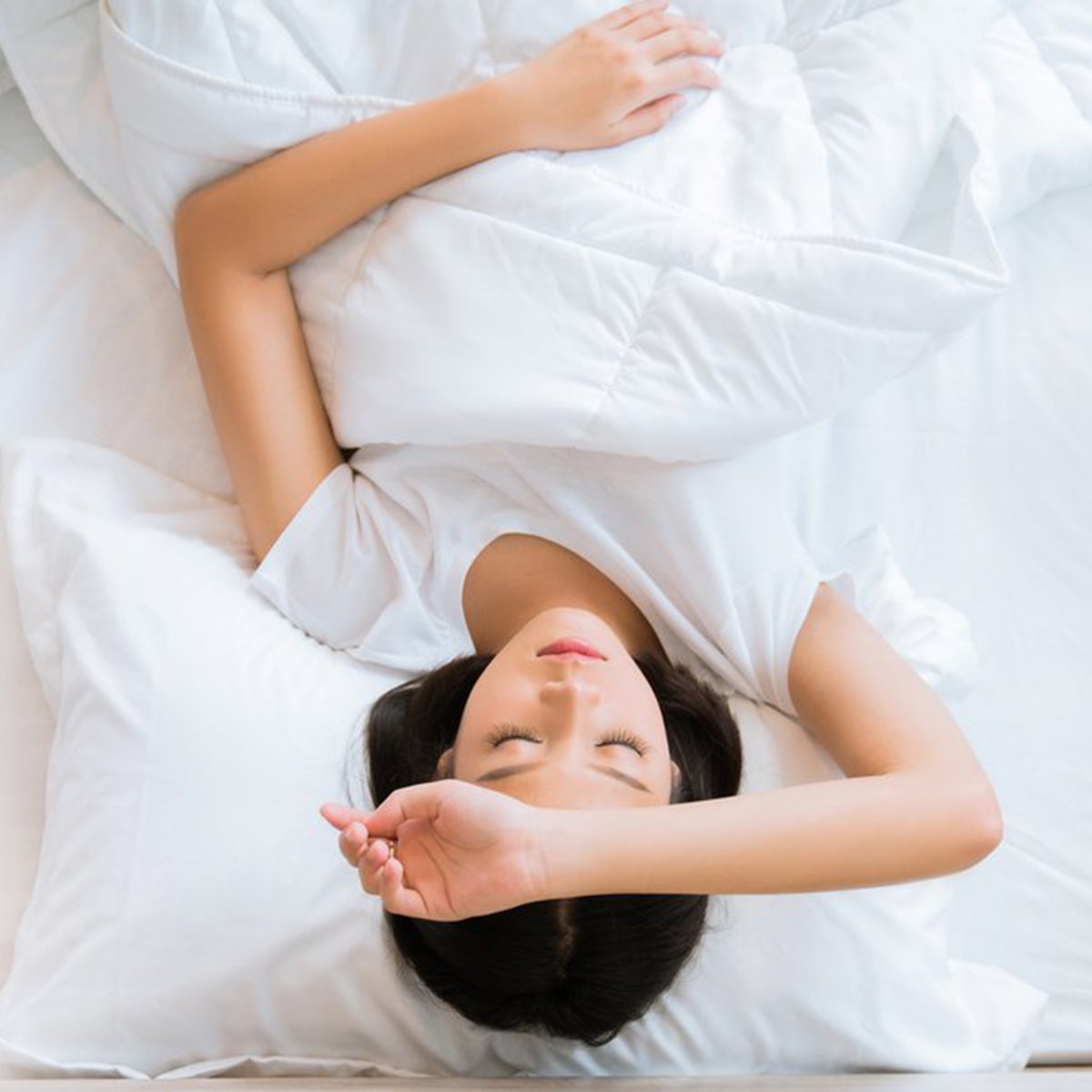 Girl sweating, hand over her head