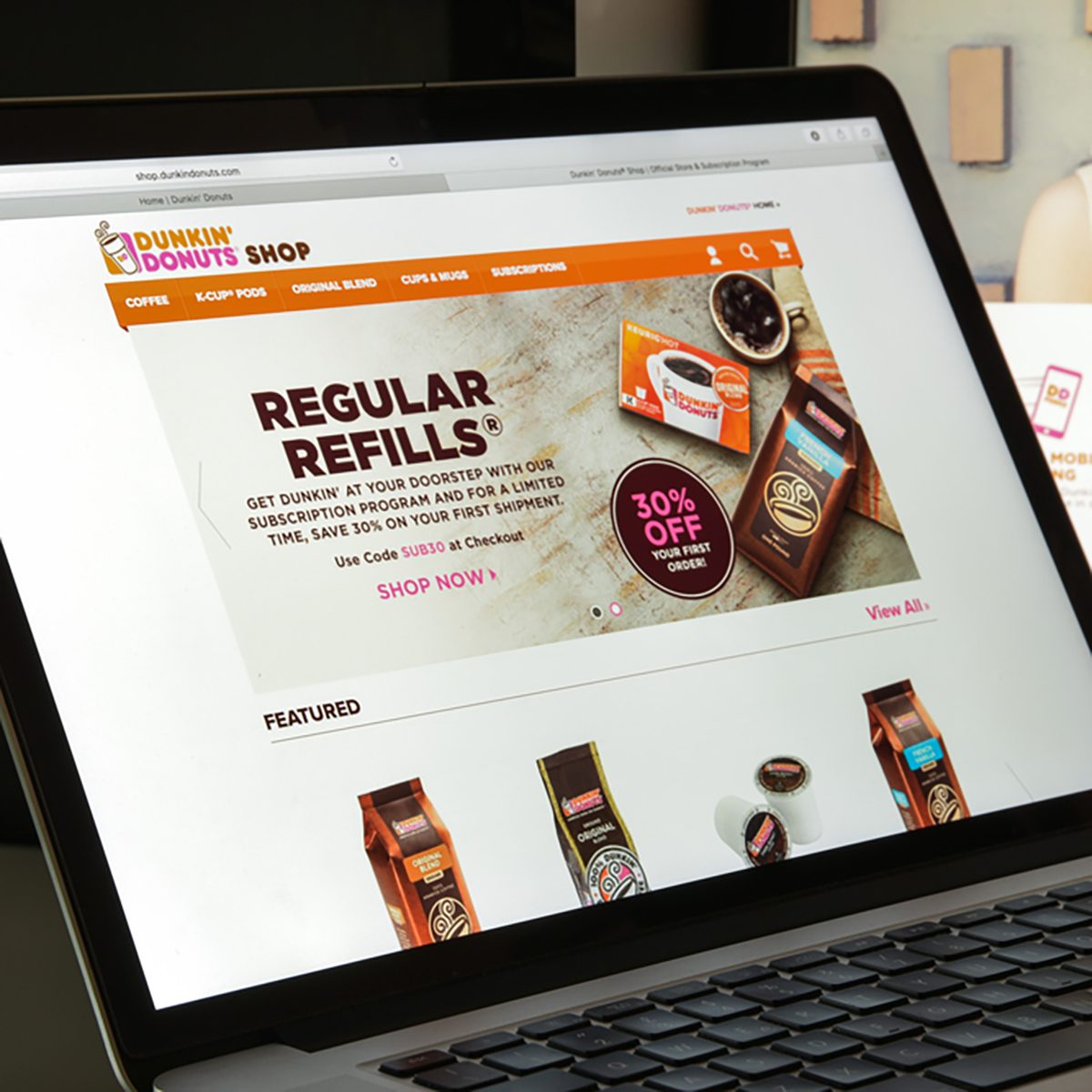 dunkindonuts.com website homepage. dunkin donuts logo visible.