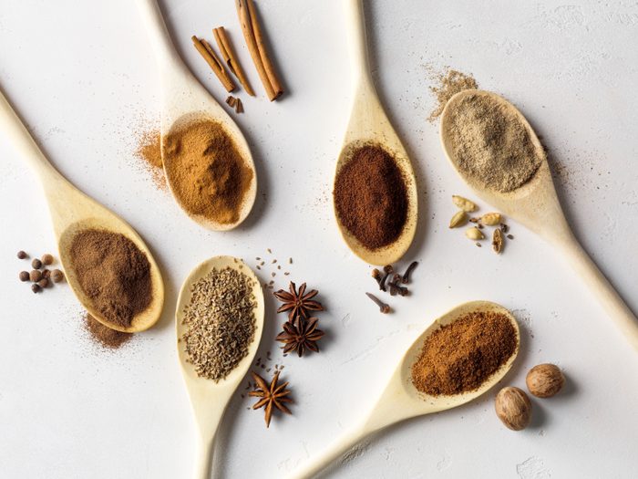 Spoonfuls of allspice, star anise, cinnamon, cloves, nutmeg, cardamom