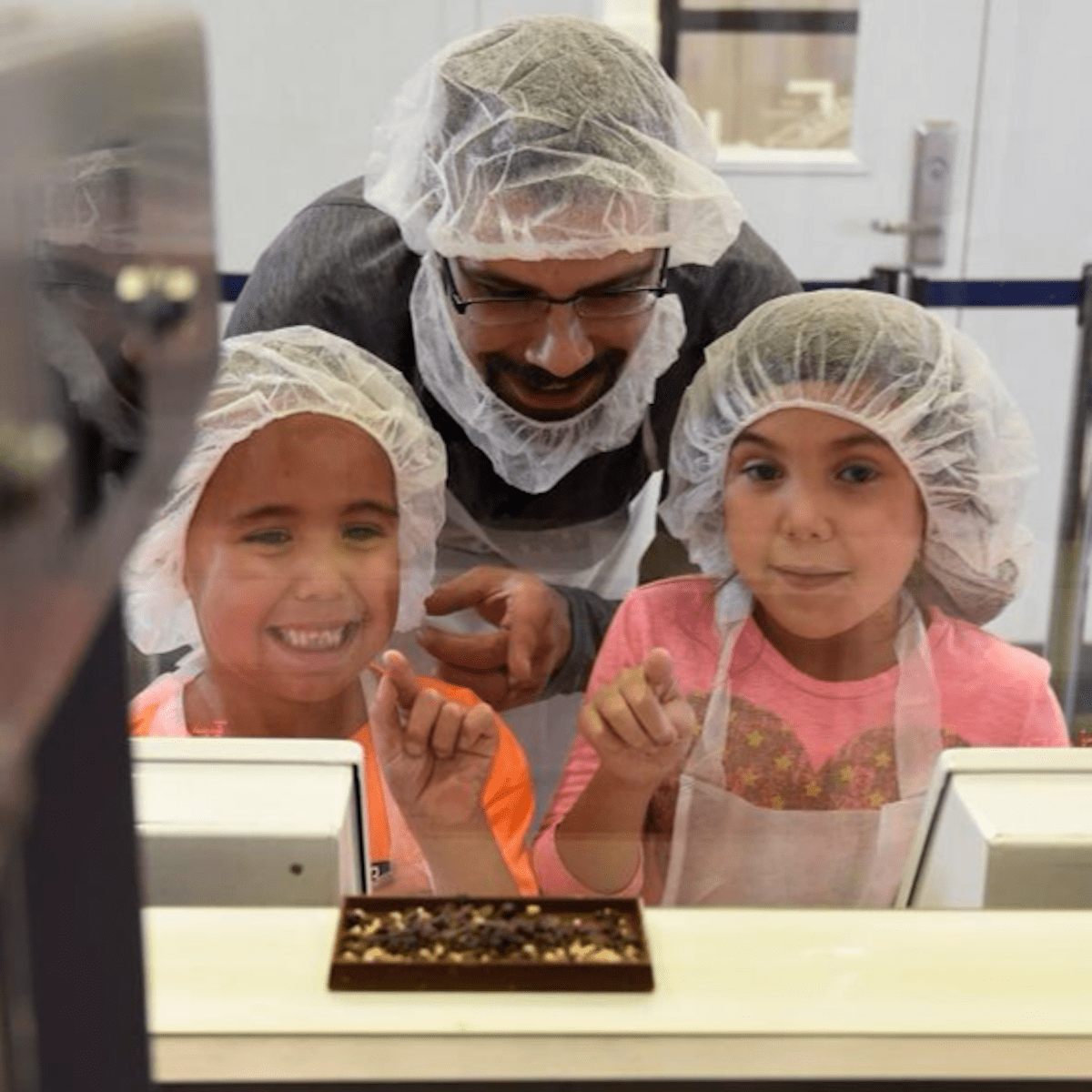 Children looking at chocolate at Hershey