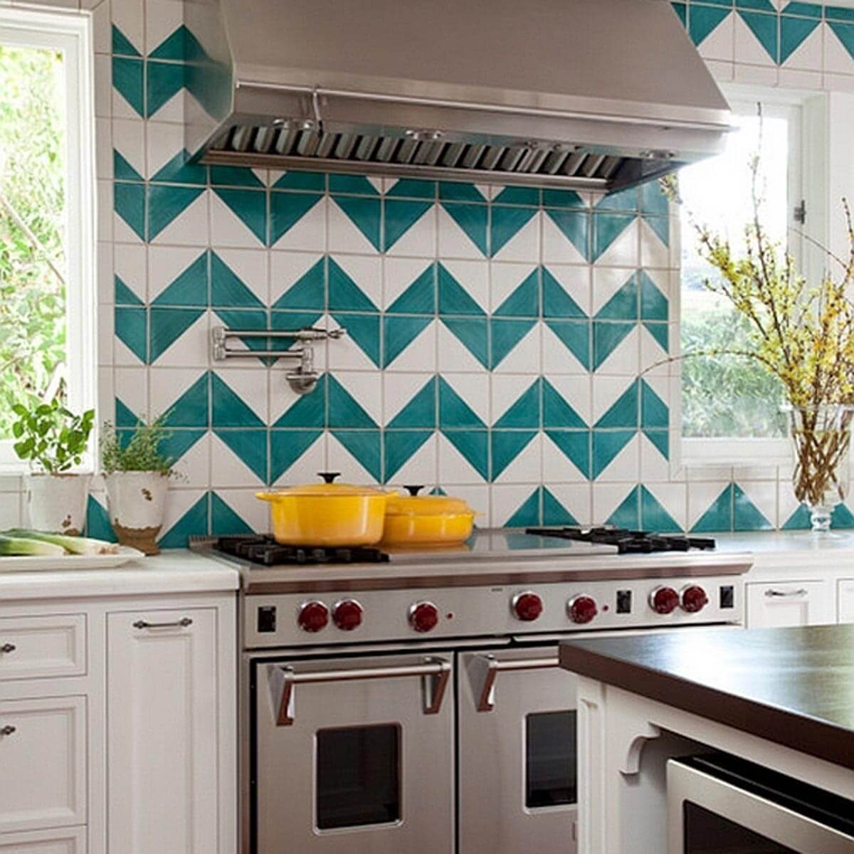 Teal and white chevron pattern backsplash