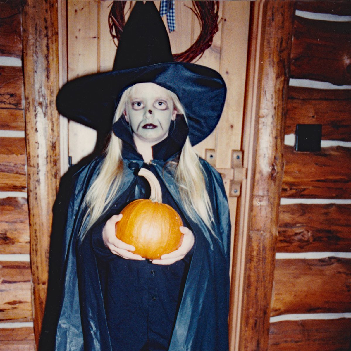 girl dressed as a witch for Halloween