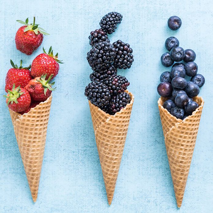 ice cream cones filled with fruit