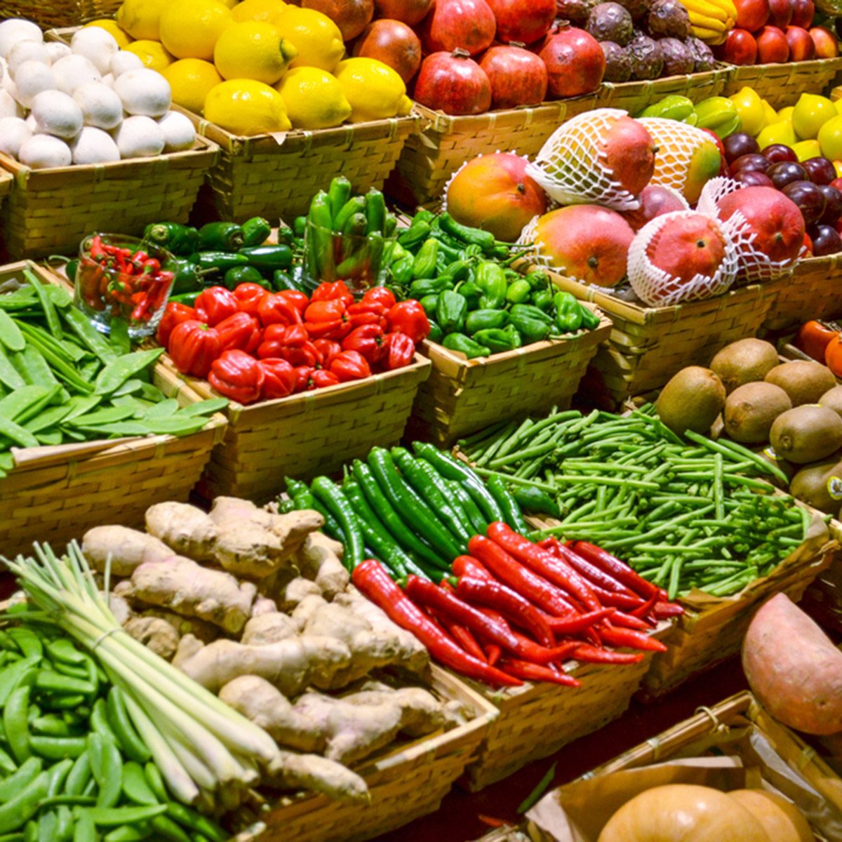 Fruit market with various colorful fresh fruits and vegetables; Shutterstock ID 130707287