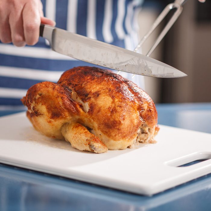 Slicing Chicken on cutting board