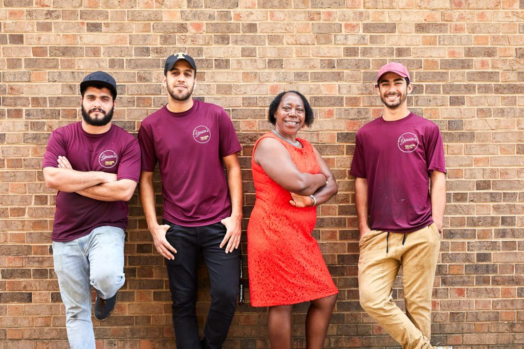 Terou’s employees from Bridge Refugee Services, with executive director Drocella Mugorewera