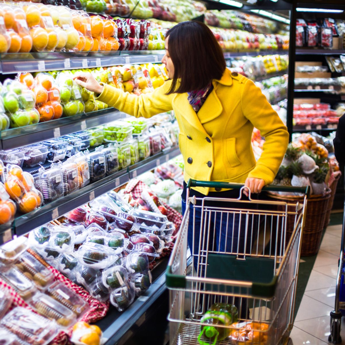Young woman shopping in the supermarket
