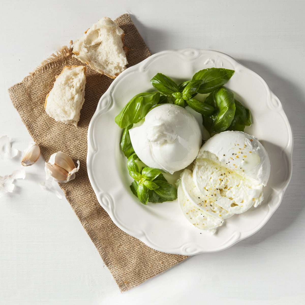 Italian burrata and mozzarella with pepper, olive oil and bread.