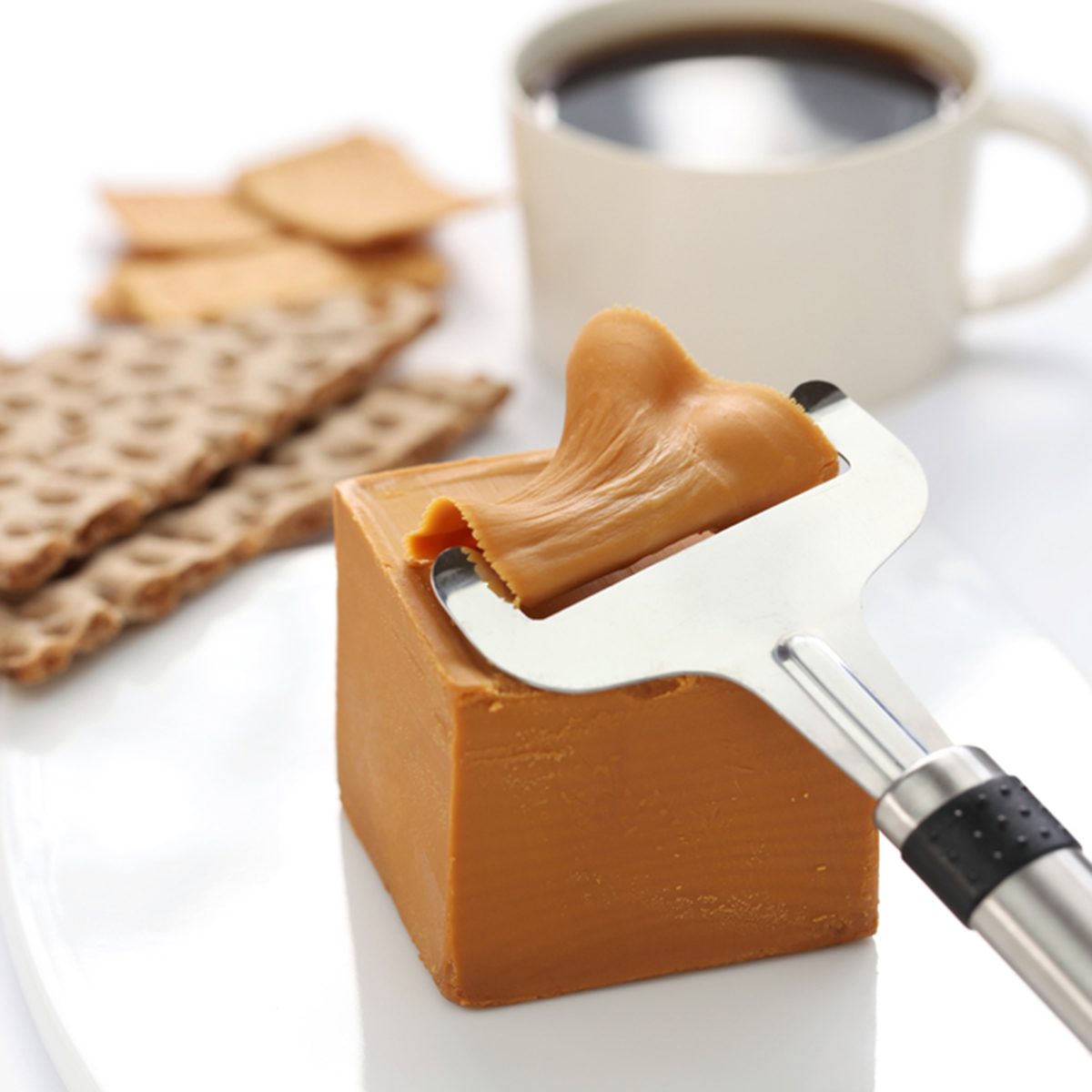 Scandinavian brown cheese, crispy bread and coffee
