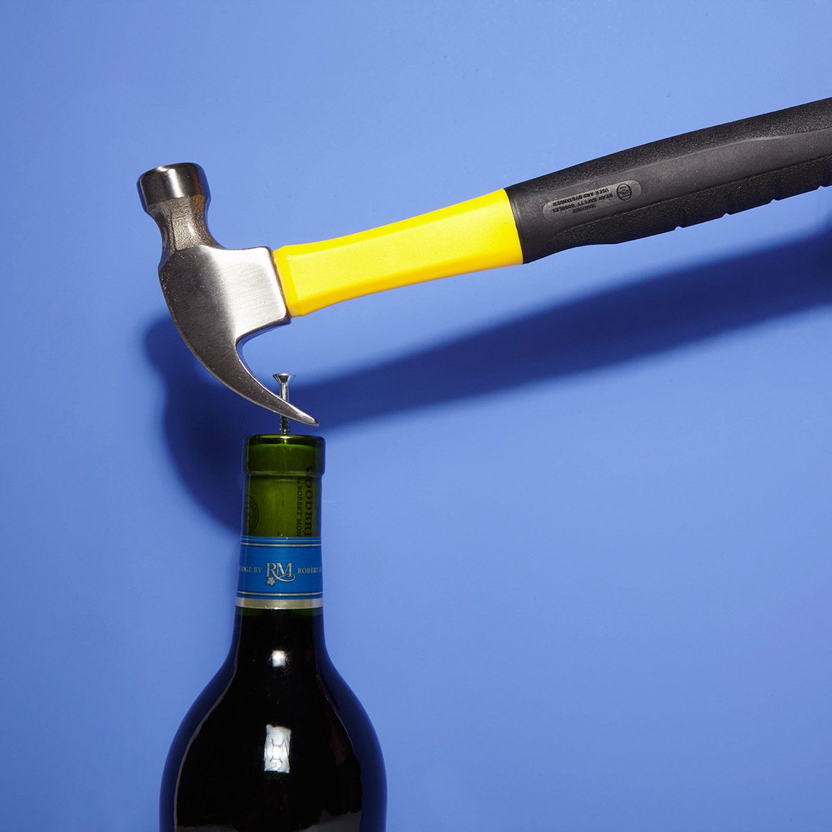 Using a hammer on a wine cork