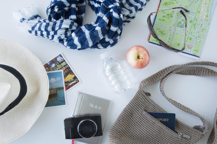 Overhead view of items being packed for traveling
