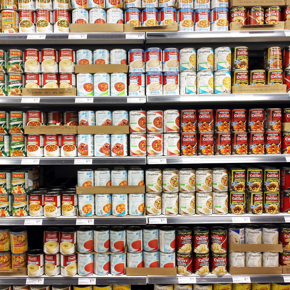 Cans on a grocery store shelf