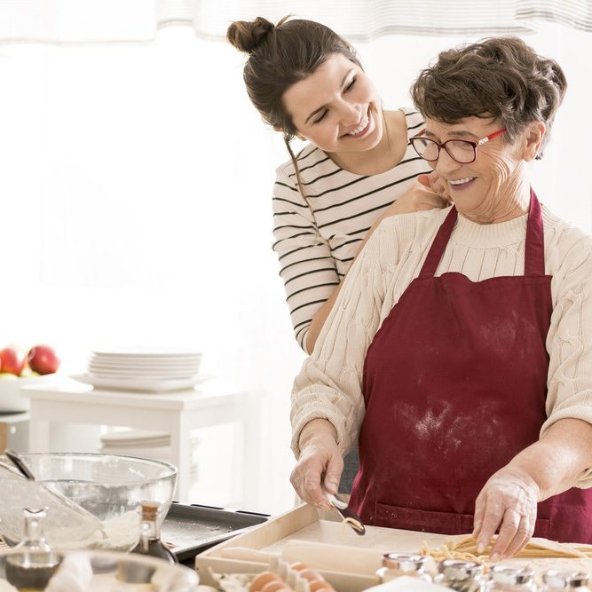 Granddaughter cooking with her happy grandma, having fun together; Shutterstock ID 661584427; Job (TFH, TOH, RD, BNB, CWM, CM): TOH Grandma