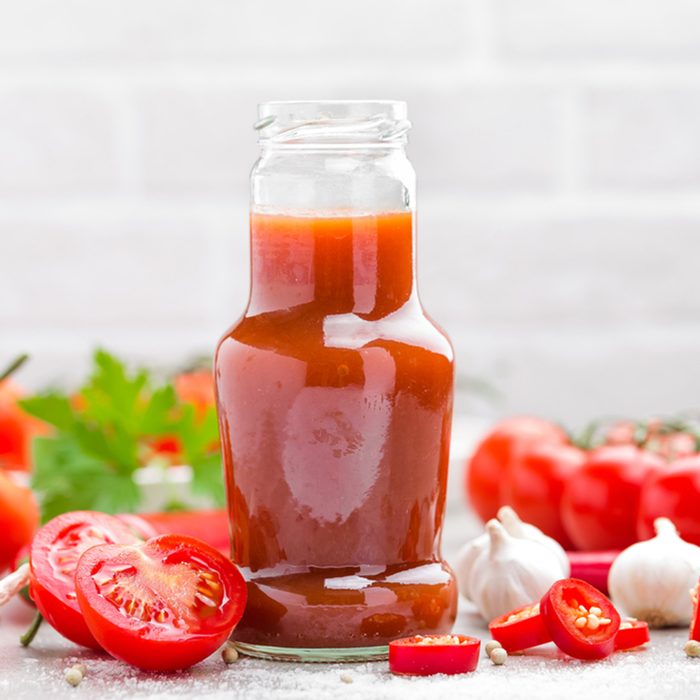 Tomato ketchup, chilli sauce, puree with chili pepper, tomatoes and garlic