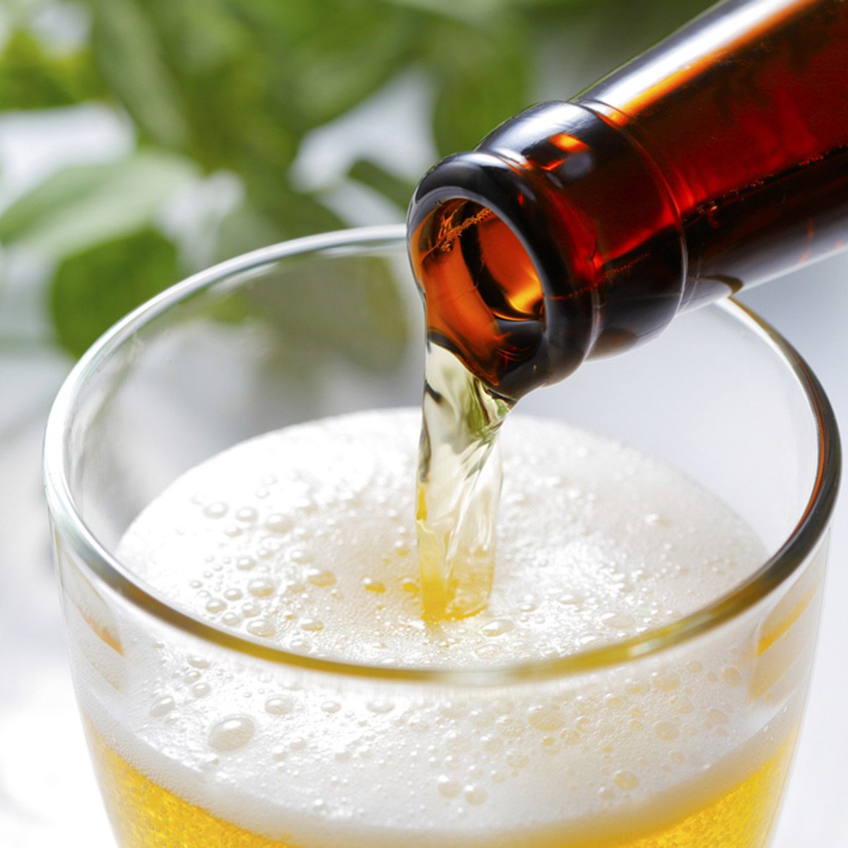 Pouring beer into glass