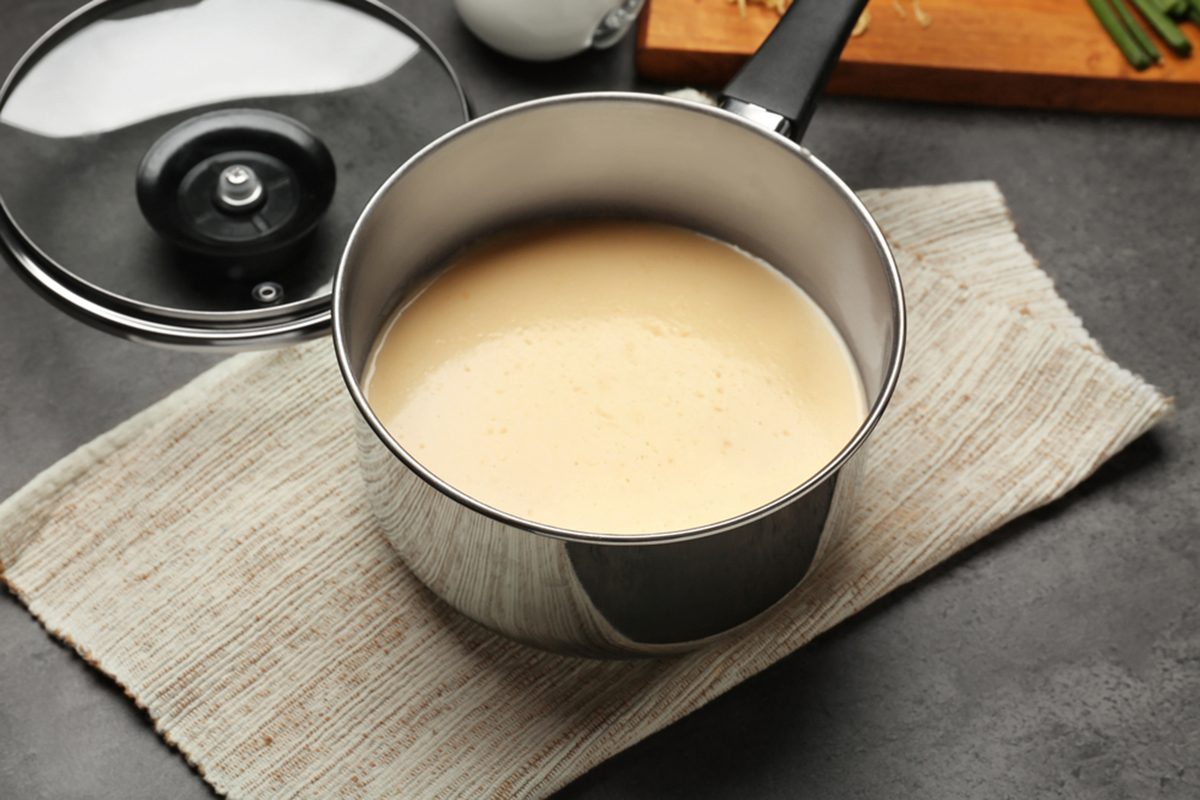 Saucepan with beer cheese dip on napkin; Shutterstock ID 612893342; Job (TFH, TOH, RD, BNB, CWM, CM): Taste of Home