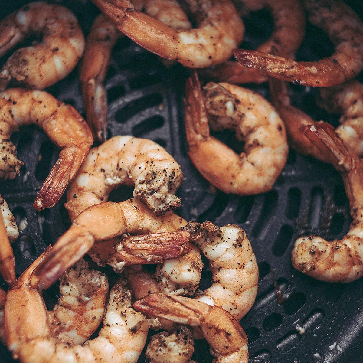 Roasted shrimps with garlic and herbs. Seafood, shelfish.