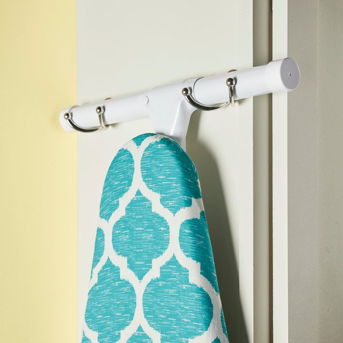 Ironing board coat hook holder