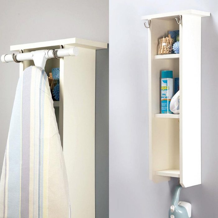 Ironing board holder center