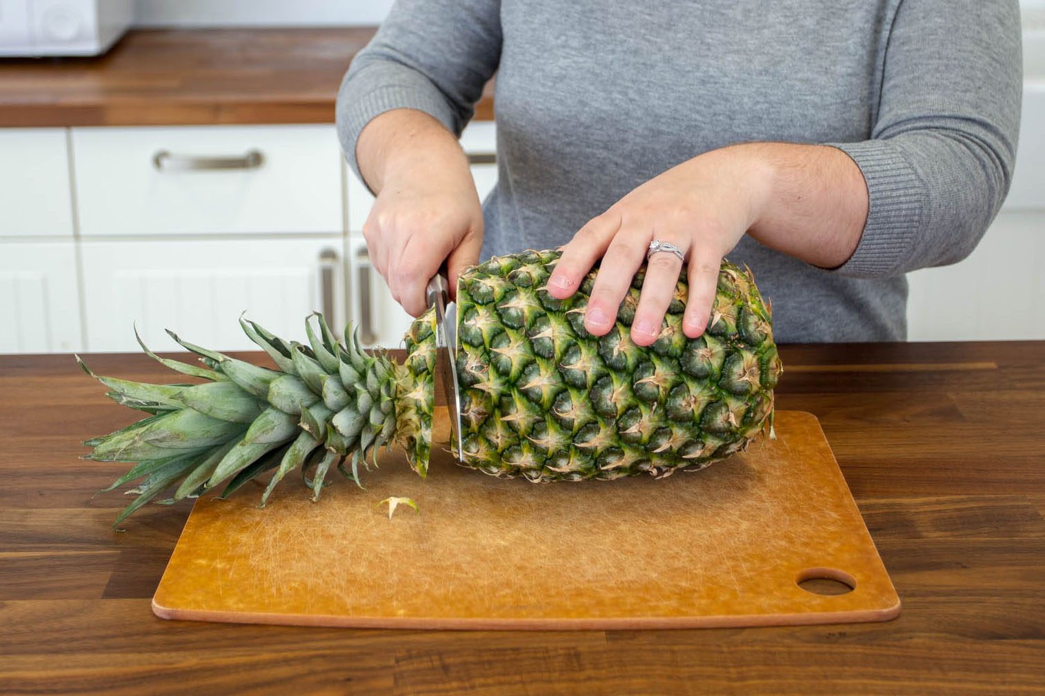 cutting pineapple