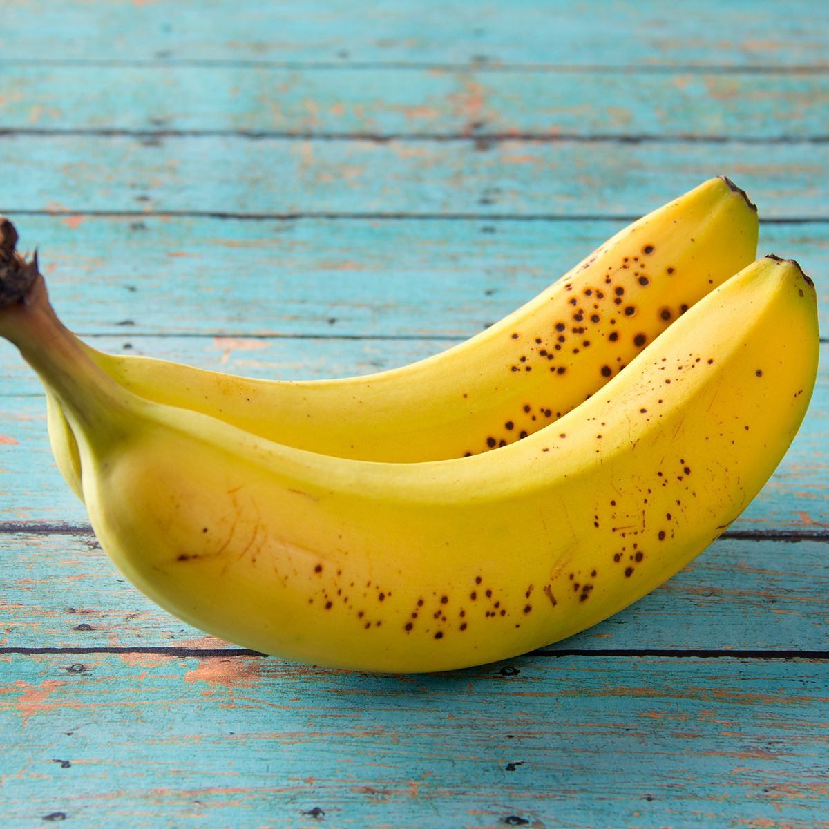 fruits for diabetics Bananas on a wooden picnic table