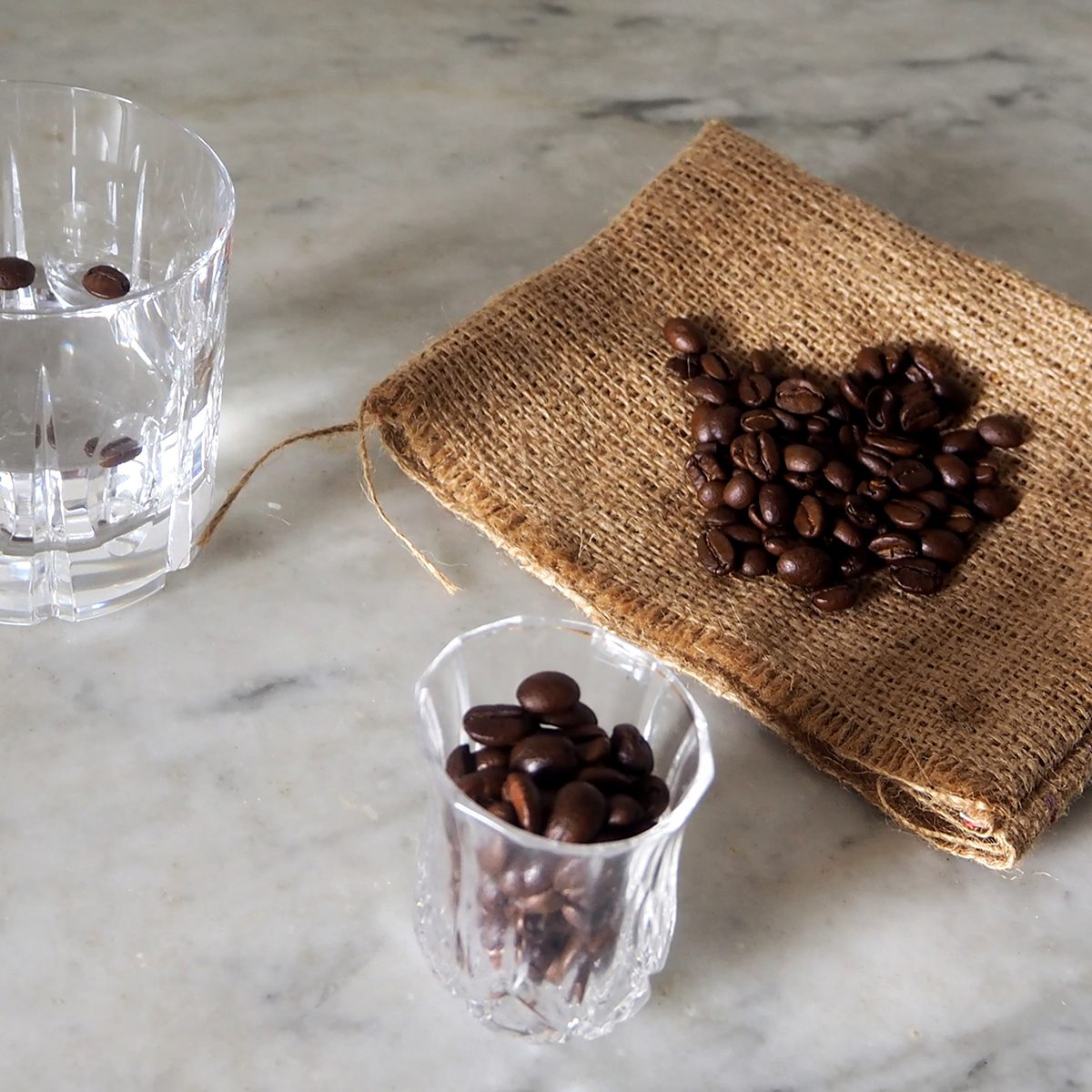 Glass of sambuca , italian liqueur, with coffee beans