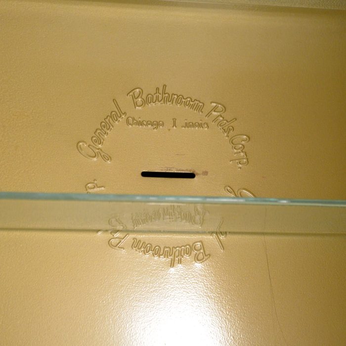 razor disposal slot in medicine cabinet