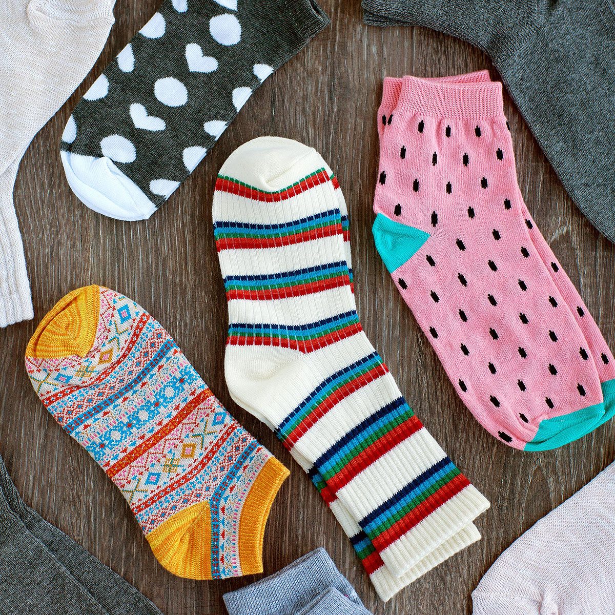 Doctor bandaging patients leg in hospital