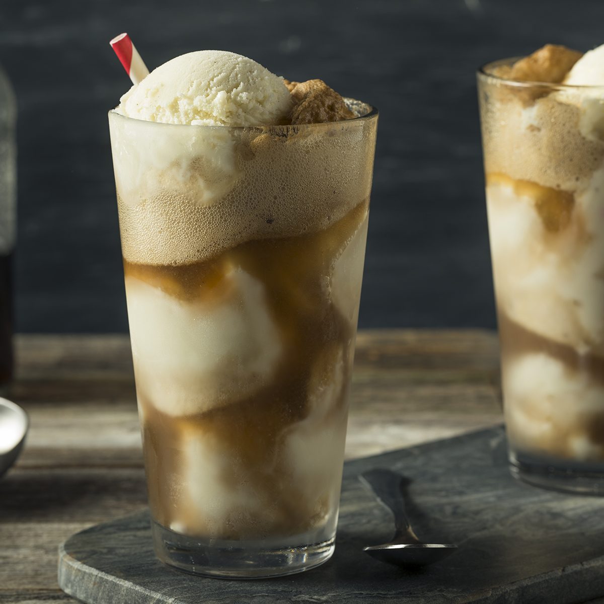 Homemade Soda Black Cow Ice Cream Float with a Straw