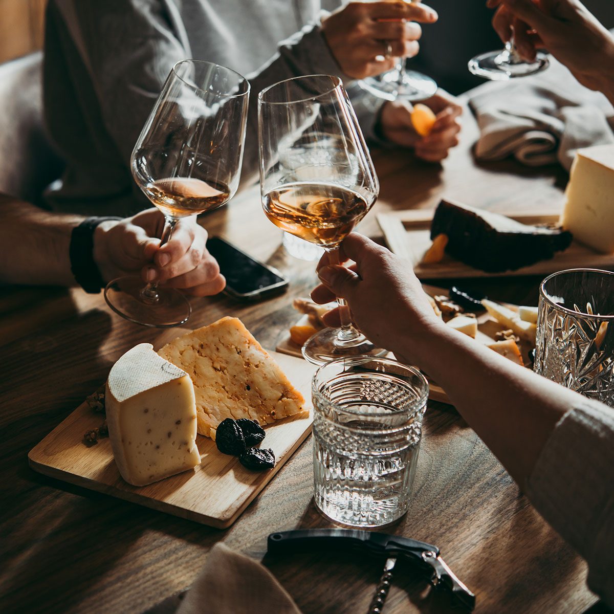 Wine and cheese served for a friendly party in a bar or a restaurant.