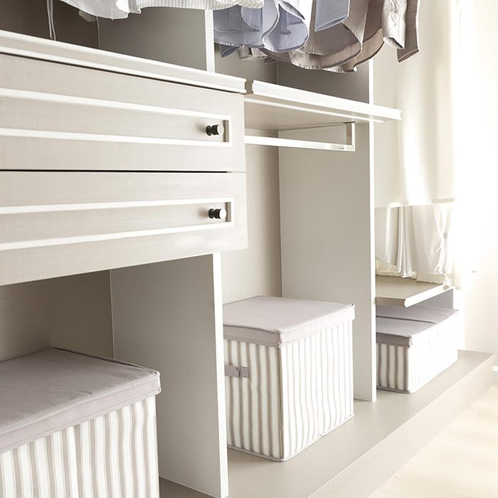 Dresser with striped boxes for organizing