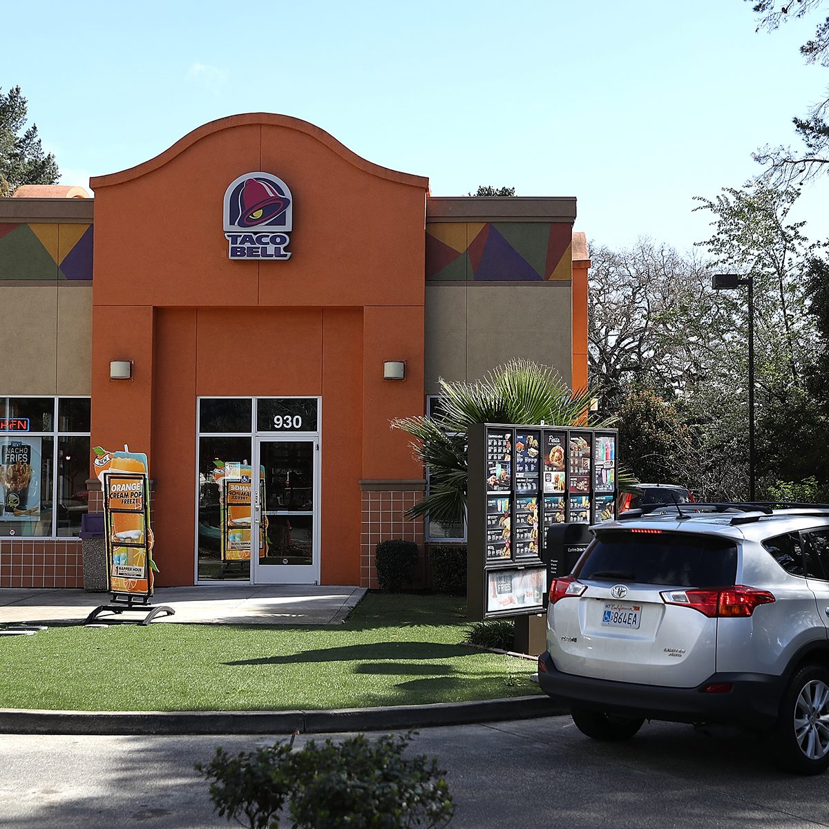 NOVATO, CA - FEBRUARY 22: A car goes through a drive thru at a Taco Bell restaurant on February 22, 2018 in Novato, California. Taco Bell has become the fourth-largest domestic restaurant brand by edging out Burger King. Taco Bell sits behind the top three restaurant chains McDonald